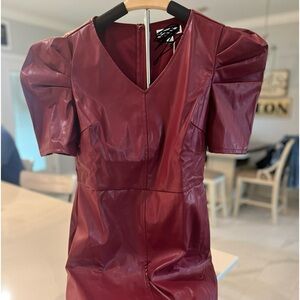 New with tags faux leather lined dress. Maroon in color. Sz small